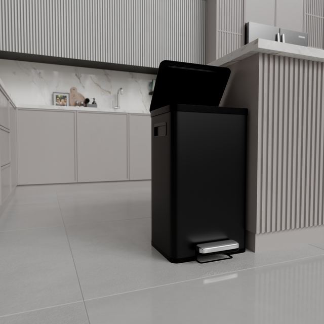 Pedal bin · black, open, in a kitchen